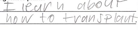 Student writing, "I learn about how to transplant"