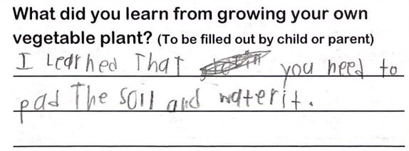 Student writing, "I learned that you need to pat the soil and water it"