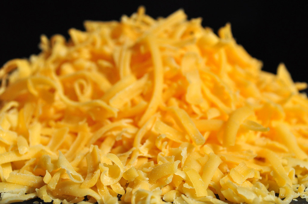 Grated cheddar cheese