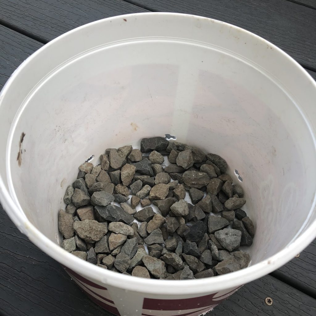 Rocks on the bottom of the container