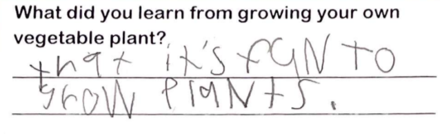Student writing "that it's fun to grow plants"