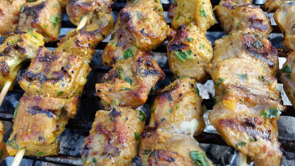 thai chicken satay skewers on a grill
