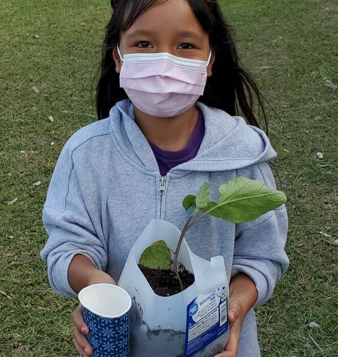 Student with final planting