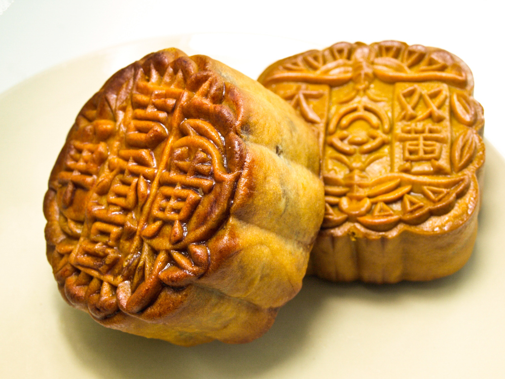 Two moon cake on a white background