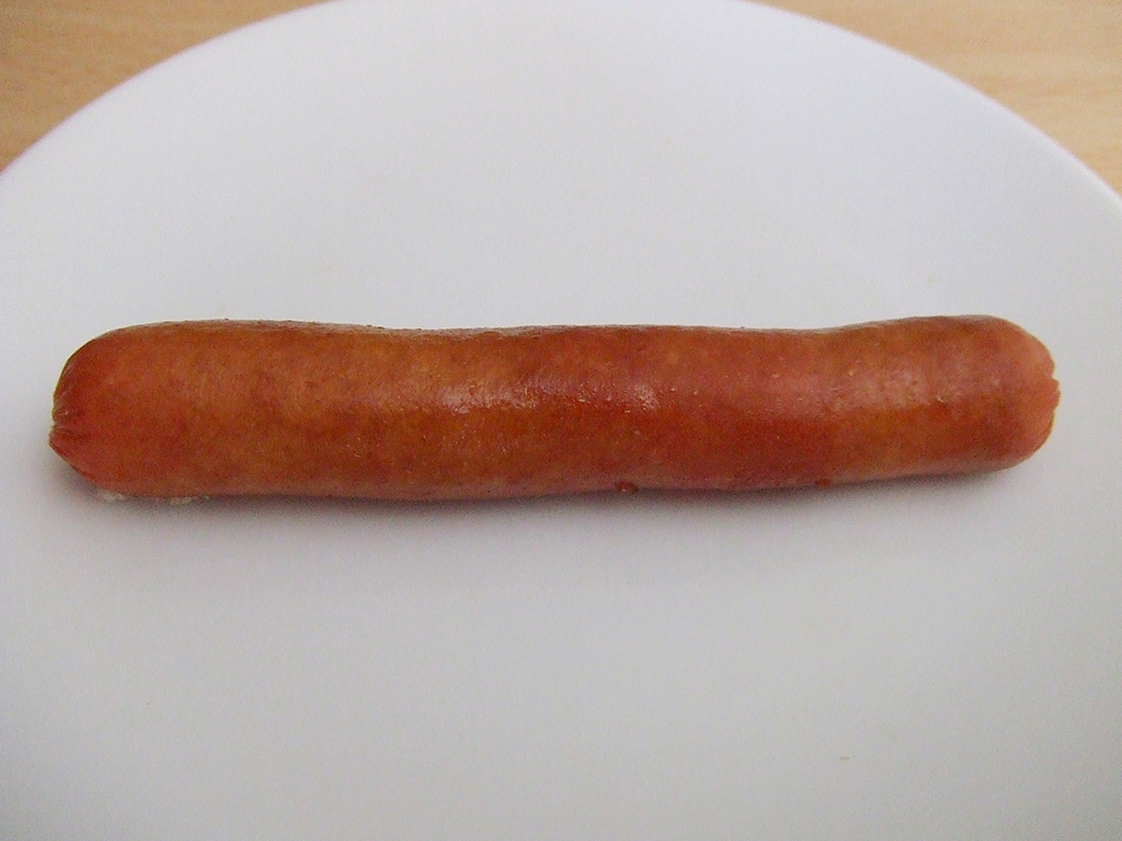 A hot dog on a plate