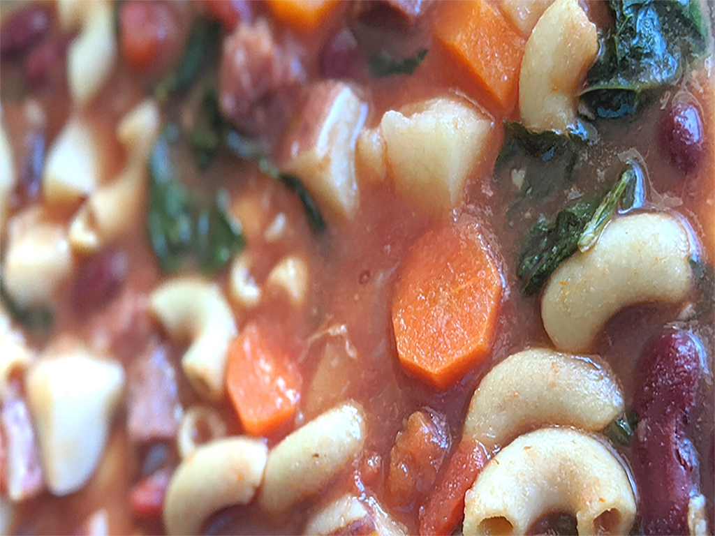 Portuguese Bean Soup with elbow noodles, carrots, and kale