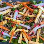 somen noodle salad with scrambled egg, lettuce, green onion, and fish cake